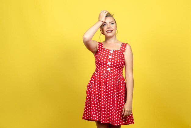 Styling A Short Red Dress Over Pants: Two Distinct Looks