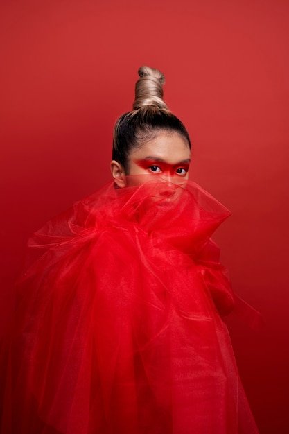 The Women Draped in Scarlet